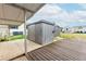 The shed is metal and provides additional storage space at 5428 Joyce St, Zephyrhills, FL 33542