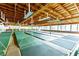 An indoor shuffleboard court with high ceilings and lots of natural light at 5428 Joyce St, Zephyrhills, FL 33542