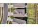 Aerial view of the home showcasing the roof, lawn, patio and surrounding properties at 5486 Summer Sunset Dr, Apollo Beach, FL 33572