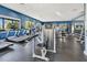 Community gym with state-of-the-art equipment and natural lighting from large windows at 5486 Summer Sunset Dr, Apollo Beach, FL 33572