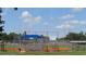 Community baseball field with dugouts and lighting, offering a fantastic place for recreation at 5561 24Th N Ter, St Petersburg, FL 33710