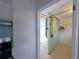 Convenient storage room featuring neutral wall paint, shelving, and utility hooks at 5561 24Th N Ter, St Petersburg, FL 33710
