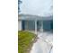 A single Gathering home with a covered front porch and small lawn needs TLC at 5720 21St W St, Bradenton, FL 34207