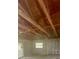 Interior image with exposed beams and drywall, and a window at 5720 21St W St, Bradenton, FL 34207
