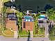 Aerial view showcases houses with pools, boat docks, landscaping, and proximity to waterways at 6104 Schooner Way, Tampa, FL 33615