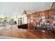 A unique outdoor bar with a wooden countertop, shelves, and an American flag on the wood-paneled wall at 6104 Schooner Way, Tampa, FL 33615