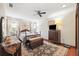 Primary bedroom featuring a ceiling fan, plush rug, and traditional furniture at 6104 Schooner Way, Tampa, FL 33615