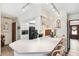 Bright kitchen featuring a breakfast bar with seating, modern appliances, and ample cabinet space at 6104 Schooner Way, Tampa, FL 33615
