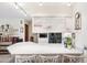Kitchen featuring breakfast bar with ample seating, modern appliances, and decorative elements at 6104 Schooner Way, Tampa, FL 33615