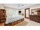 Comfortable bedroom with ceiling fan and dresser at 6104 Schooner Way, Tampa, FL 33615