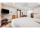 Comfortable bedroom features ceiling fan and dresser at 6104 Schooner Way, Tampa, FL 33615