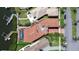 Aerial view of a luxury home with a private dock and screened pool at 6201 Marbella Blvd, Apollo Beach, FL 33572