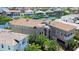 Waterfront home showcasing a tile roof and manicured landscaping at 6201 Marbella Blvd, Apollo Beach, FL 33572