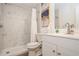 Renovated bathroom featuring new vanity, toilet, and shower with marble tiling at 6225 76Th N Ave, Pinellas Park, FL 33781
