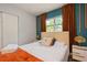 Bedroom with large windows, a closet, and a queen size bed at 6225 76Th N Ave, Pinellas Park, FL 33781