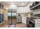 Efficient kitchen featuring modern appliances, ample counter space, and hardwood flooring at 6225 76Th N Ave, Pinellas Park, FL 33781