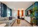 Stylish living room featuring modern furniture, decorative accents, and hardwood flooring at 6225 76Th N Ave, Pinellas Park, FL 33781