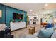 Open-concept living space with modern decor, hardwood floors, and plenty of natural light at 6225 76Th N Ave, Pinellas Park, FL 33781