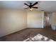 Spacious, carpeted bedroom with fan at 7326 Cutwater Ln, Wesley Chapel, FL 33545