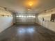 Spacious garage with open door at 7326 Cutwater Ln, Wesley Chapel, FL 33545