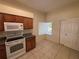 Well-organized kitchen with appliances and window view at 7326 Cutwater Ln, Wesley Chapel, FL 33545