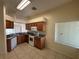 An efficient kitchen, featuring ample counter space and modern appliances at 7326 Cutwater Ln, Wesley Chapel, FL 33545