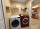 Laundry room with side by side washer and dryer at 7326 Cutwater Ln, Wesley Chapel, FL 33545