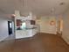 Open floor plan seamlessly connects the kitchen and living areas at 7326 Cutwater Ln, Wesley Chapel, FL 33545