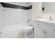 Updated bathroom with tub and shower combination, white subway tile and modern vanity at 7701 Starkey Rd # 445, Seminole, FL 33777