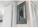Electrical panel access near door and shuttered closet in this home at 7701 Starkey Rd # 445, Seminole, FL 33777
