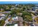Scenic aerial view showcasing a neighborhood, lush greenery, and water views at 843 37Th Ne Ave, St Petersburg, FL 33704