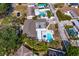 An aerial view of a home with a pool and a lush green yard at 843 37Th Ne Ave, St Petersburg, FL 33704