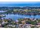 Scenic aerial view of waterfront properties and a nearby golf course at 843 37Th Ne Ave, St Petersburg, FL 33704