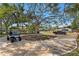 Circular driveway and well maintained front yard with mature landscaping at 843 37Th Ne Ave, St Petersburg, FL 33704