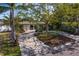 Charming home with a circular driveway, lush landscaping, and a classic architectural design creating inviting curb appeal at 843 37Th Ne Ave, St Petersburg, FL 33704