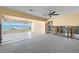Spacious living room featuring waterfront views and tile floors ready for customization at 844 Bay Point Dr, Madeira Beach, FL 33708