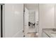 Bright and clean bathroom leading to a well-lit office space at 8946 Ivy Stark Blvd, Wesley Chapel, FL 33545