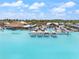 The lagoon with white sand, cabanas, and lounge areas provide a serene community hangout at 8946 Ivy Stark Blvd, Wesley Chapel, FL 33545