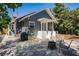 Charming backyard patio with a fire pit and mature landscaping, perfect for outdoor entertaining at 930 23Rd N Ave, St Petersburg, FL 33704