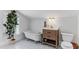Charming bathroom featuring a clawfoot tub, modern vanity, and stylish patterned tile flooring at 930 23Rd N Ave, St Petersburg, FL 33704