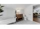 Bright bathroom with clawfoot tub, wooden vanity, and tiled floors adjacent to living area at 930 23Rd N Ave, St Petersburg, FL 33704