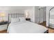 Airy bedroom with a plush bed, stylish side tables, and ample closet space at 930 23Rd N Ave, St Petersburg, FL 33704