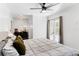 Comfortable bedroom featuring a bed, a black dresser, and French doors that lead to a patio at 930 23Rd N Ave, St Petersburg, FL 33704