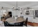 Bright dining room showcasing the round table with the kitchen and living room nearby at 930 23Rd N Ave, St Petersburg, FL 33704