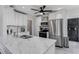 Modern kitchen features stainless steel appliances, marble countertops, and white cabinetry at 930 23Rd N Ave, St Petersburg, FL 33704