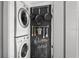 Handy laundry area equipped with stackable washer/dryer plus modern decor with chalkboard art at 930 23Rd N Ave, St Petersburg, FL 33704