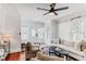 Open-concept living room featuring light walls, hardwood floors, and stylish furnishings at 930 23Rd N Ave, St Petersburg, FL 33704