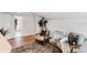 Cozy living room with wood floors and vintage furniture, creating a relaxing and inviting space at 930 23Rd N Ave, St Petersburg, FL 33704