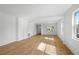 The spacious living room has ceramic tile floors and ample natural light from many windows at 930 57Th N Ave, St Petersburg, FL 33703