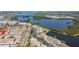 Aerial view of complex near to lake and other residences at 10035 63Rd N Ave # 12, St Petersburg, FL 33708